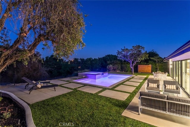 12350 Mclennan Ave, Granada Hills, CA 91344 - pool at twilight featuring a patio, an outdoor living space, a pool with connected hot tub, and a yard