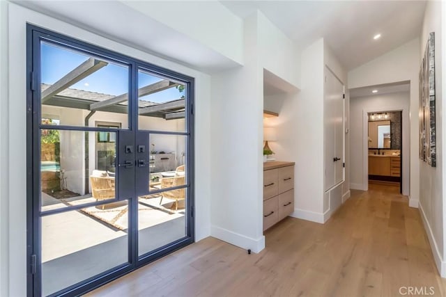 12350 Mclennan Ave, Granada Hills, CA 91344 - entryway featuring french doors, wood finished floors, and recessed lighting