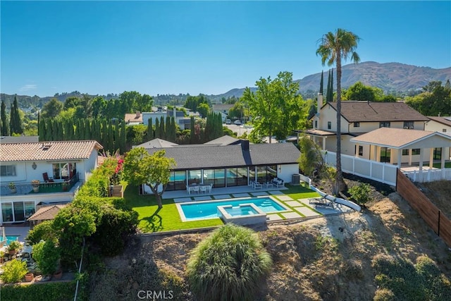 12350 Mclennan Ave, Granada Hills, CA 91344 - aerial view of residential area featuring a pool and a mountainous background