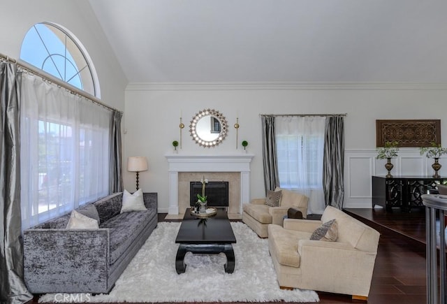4330 E Cornwall Ave, Orange, CA 92867 - living area with wood finished floors, a fireplace, crown molding, and lofted ceiling