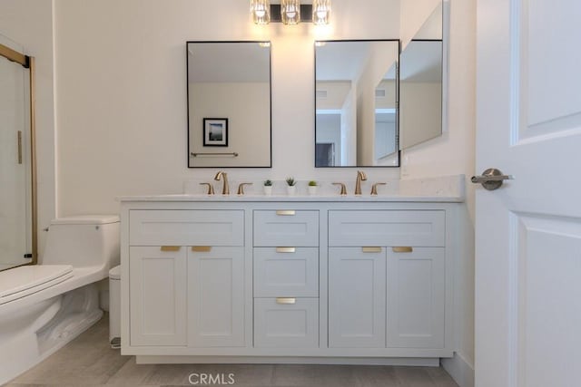 4330 E Cornwall Ave, Orange, CA 92867 - full bath featuring double vanity, wood finished floors, and a shower with door
