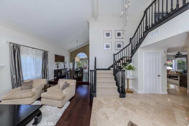 4330 E Cornwall Ave, Orange, CA 92867 - living room with stairway, high vaulted ceiling, ornamental molding, and ceiling fan