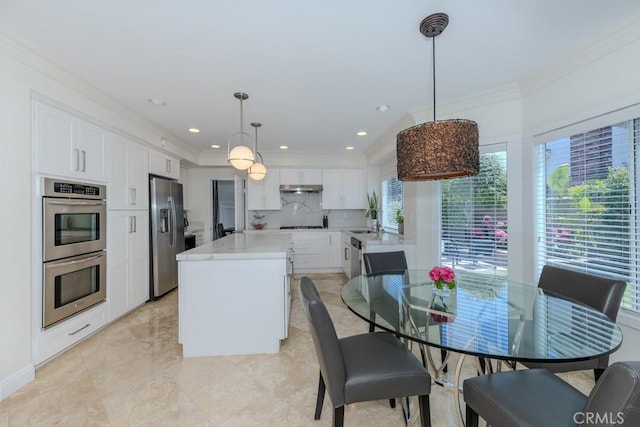 4330 E Cornwall Ave, Orange, CA 92867 - dining area featuring crown molding, light marble finish floors, and recessed lighting