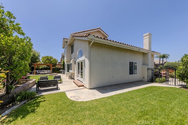 4330 E Cornwall Ave, Orange, CA 92867 - rear view of house with a pergola, a patio, stucco siding, a tiled roof, and an outdoor living space