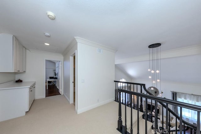 4330 E Cornwall Ave, Orange, CA 92867 - corridor featuring an upstairs landing, ornamental molding, and light colored carpet