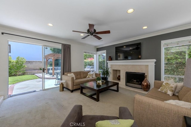 4330 E Cornwall Ave, Orange, CA 92867 - carpeted living area featuring recessed lighting, a fireplace, ceiling fan, and crown molding
