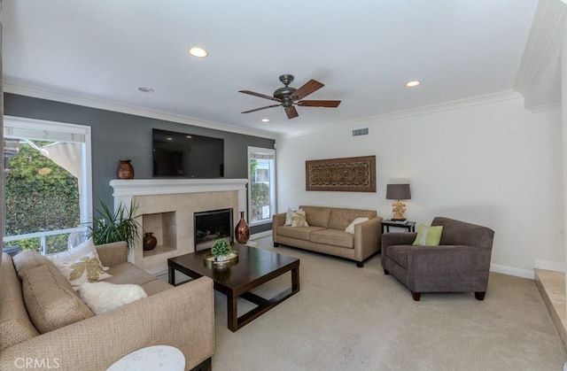 4330 E Cornwall Ave, Orange, CA 92867 - living area featuring a ceiling fan, a fireplace, recessed lighting, ornamental molding, and light colored carpet
