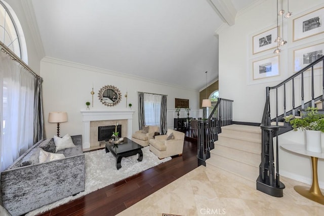 4330 E Cornwall Ave, Orange, CA 92867 - living room featuring wood finished floors, stairs, crown molding, and a high end fireplace