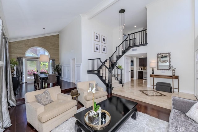 4330 E Cornwall Ave, Orange, CA 92867 - living room featuring stairway, high vaulted ceiling, wood finished floors, and ornamental molding