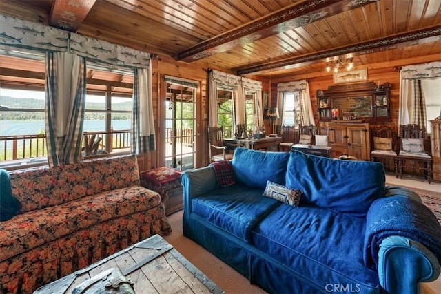 115 Lagunita Ln, Big Bear Lake, CA 92315 - living room with a wooden ceiling with exposed beams, wooden walls, and a water view