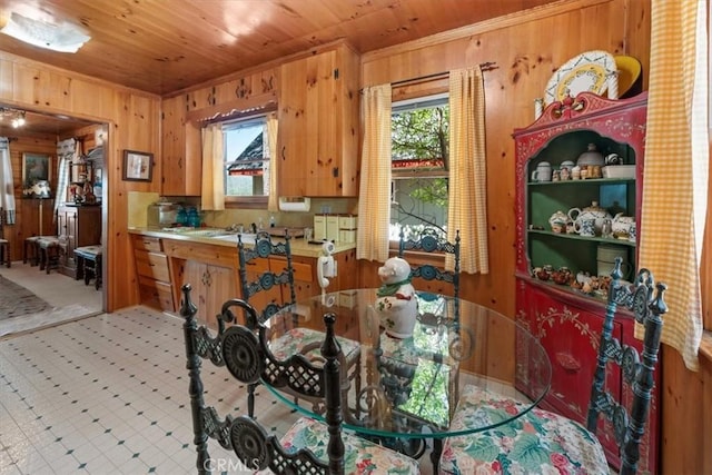 115 Lagunita Ln, Big Bear Lake, CA 92315 - dining area featuring wooden walls, wooden ceiling, and crown molding