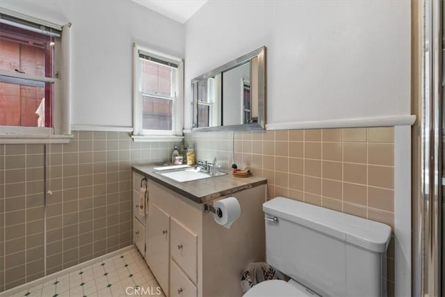 115 Lagunita Ln, Big Bear Lake, CA 92315 - bathroom with tile walls, vanity, wainscoting, and tile patterned floors