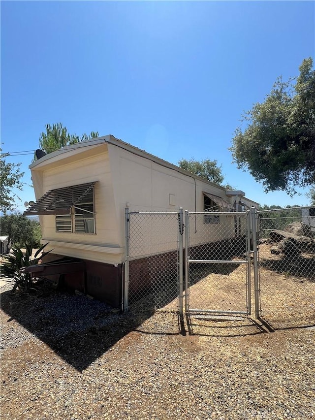 38150 Sumac Ln, Squaw Valley, CA 93675 - view of property exterior featuring a gate