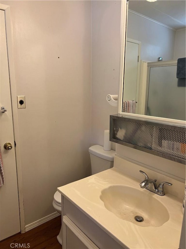 38150 Sumac Ln, Squaw Valley, CA 93675 - bathroom with vanity, wood finished floors, and ornamental molding