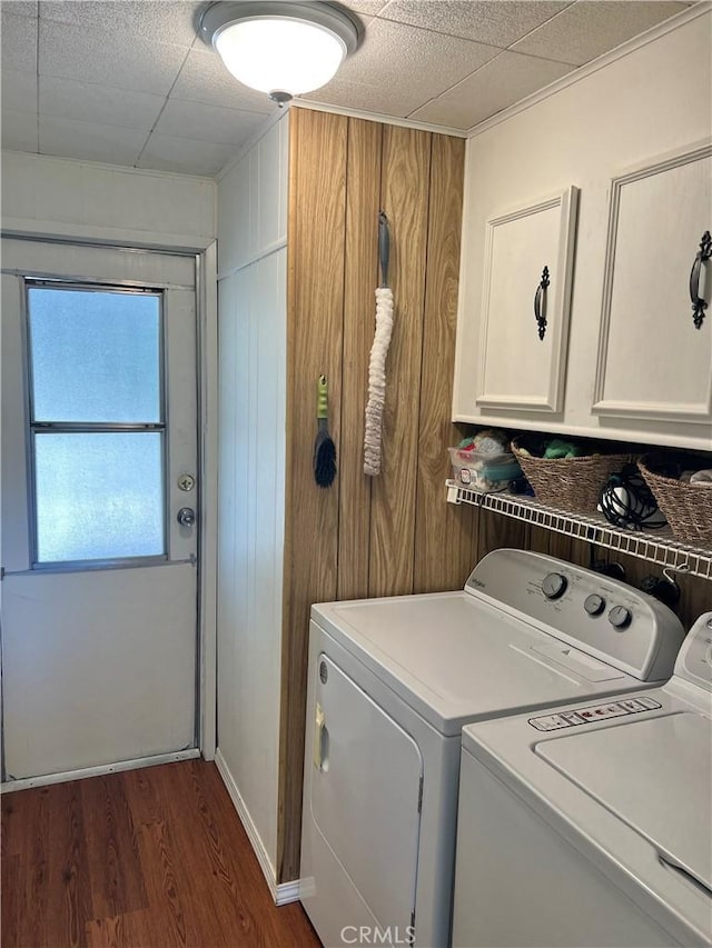 38150 Sumac Ln, Squaw Valley, CA 93675 - laundry area with cabinet space, washing machine and dryer, and dark wood-style flooring