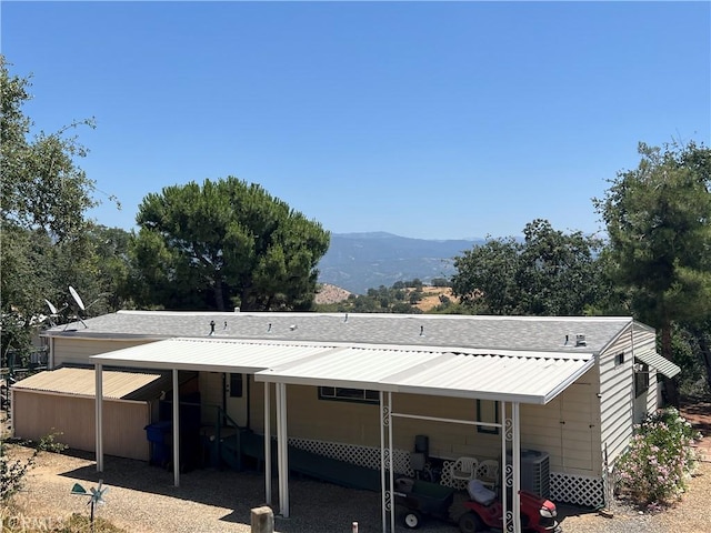 38150 Sumac Ln, Squaw Valley, CA 93675 - back of house with a mountain view and roof with shingles