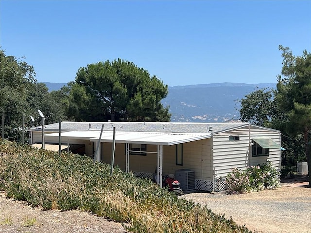 38150 Sumac Ln, Squaw Valley, CA 93675 - back of property featuring a mountain view and a carport