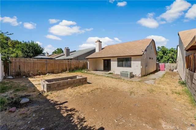 37632 15th St E, Palmdale, CA 93550 - back of house with a garden, a fenced backyard, stucco siding, and roof with shingles