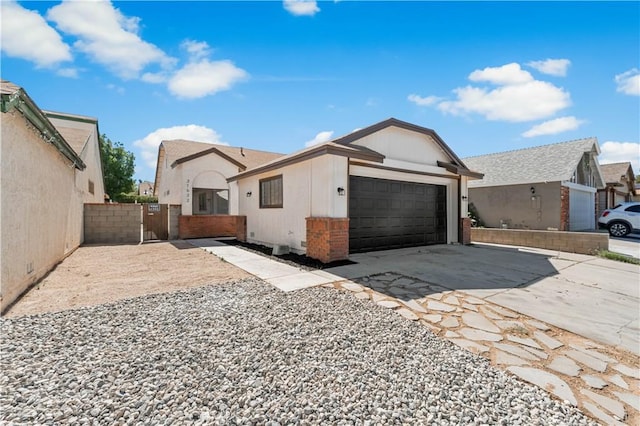37632 15th St E, Palmdale, CA 93550 - view of front of house with driveway and an attached garage