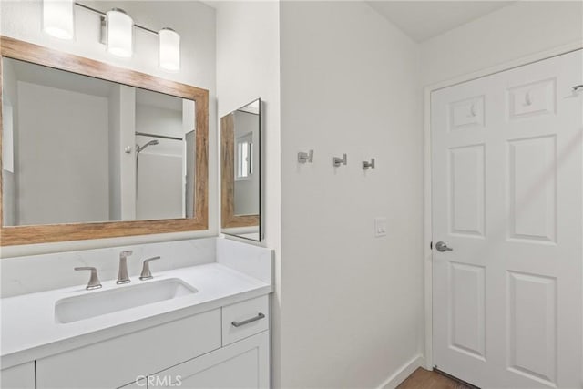 242 N 10th St Unit 242, Grover Beach, CA 93433 - bathroom with vanity and baseboards