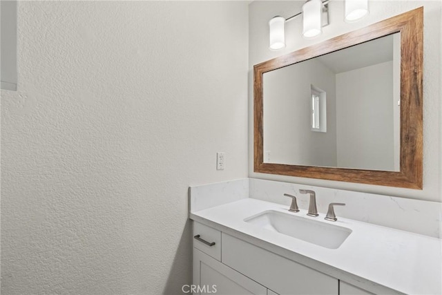 242 N 10th St Unit 242, Grover Beach, CA 93433 - bathroom with vanity and a textured wall