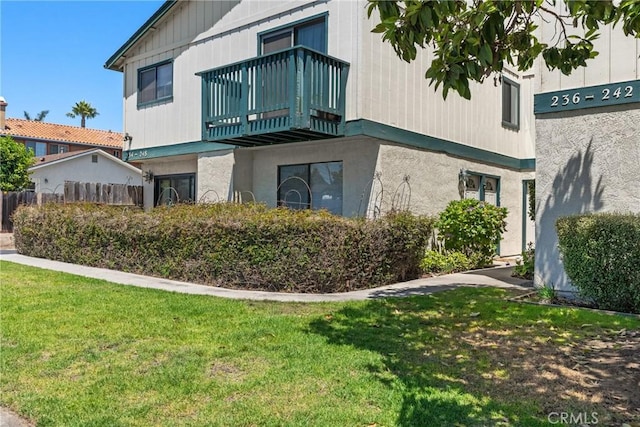 242 N 10th St Unit 242, Grover Beach, CA 93433 - view of side of home featuring a balcony