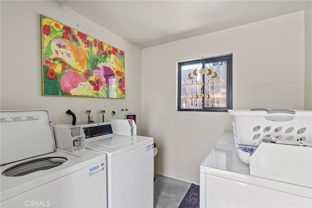 242 N 10th St Unit 242, Grover Beach, CA 93433 - communal laundry room with washing machine and dryer and baseboards