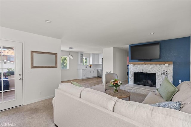 242 N 10th St Unit 242, Grover Beach, CA 93433 - living room featuring a fireplace and recessed lighting
