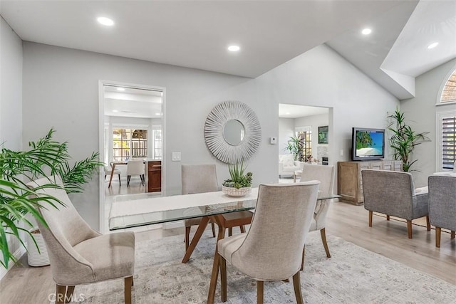 12152 Napoli Dr, Cerritos, CA 90703 - dining space with light wood-style floors, recessed lighting, and vaulted ceiling