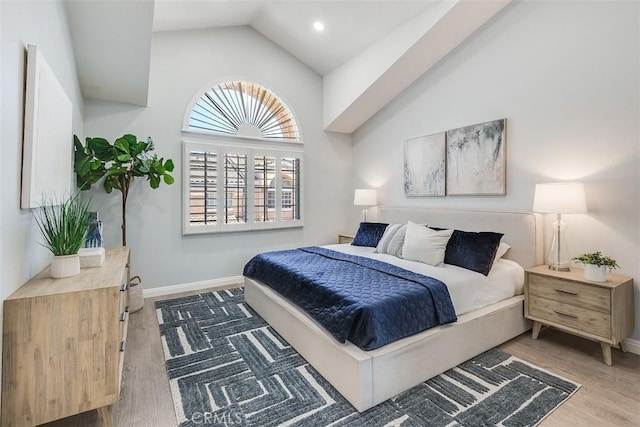 12152 Napoli Dr, Cerritos, CA 90703 - bedroom featuring wood finished floors, high vaulted ceiling, and recessed lighting