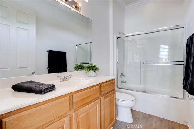 1740 Las Colinas Rd, Beaumont, CA 92223 - full bath with crown molding, vanity, wood finished floors, and combined bath / shower with glass door