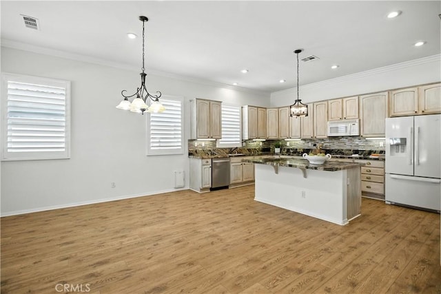 1740 Las Colinas Rd, Beaumont, CA 92223 - kitchen featuring white appliances, a chandelier, ornamental molding, backsplash, and recessed lighting