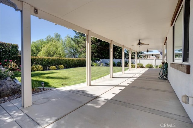 1740 Las Colinas Rd, Beaumont, CA 92223 - fenced backyard featuring a ceiling fan and a patio area