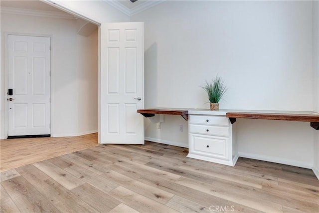 1740 Las Colinas Rd, Beaumont, CA 92223 - unfurnished office with ornamental molding, light wood finished floors, built in desk, and arched walkways