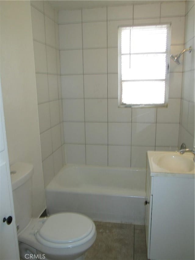 201 W Williams St, Barstow, CA 92311 - full bathroom featuring vanity, tile patterned flooring, and washtub / shower combination