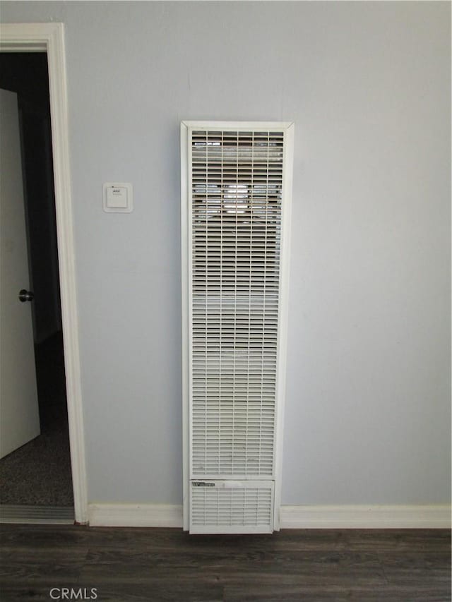 201 W Williams St, Barstow, CA 92311 - detailed view of a heating unit and wood finished floors
