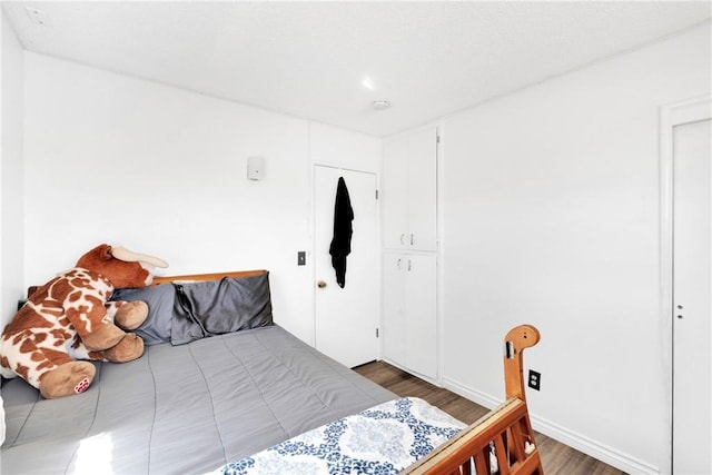 10000 8th Ave, Hesperia, CA 92345 - bedroom with wood finished floors