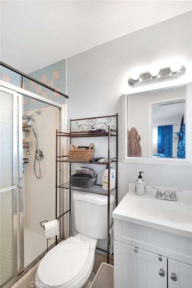 10000 8th Ave, Hesperia, CA 92345 - bathroom featuring a shower with shower door and vanity