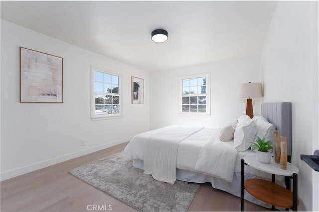 13203 Lakewood Blvd, Downey, CA 90242 - bedroom with wood finished floors and baseboards