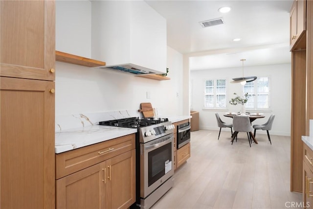 13203 Lakewood Blvd, Downey, CA 90242 - kitchen with appliances with stainless steel finishes, light wood-type flooring, wall chimney exhaust hood, recessed lighting, and decorative light fixtures