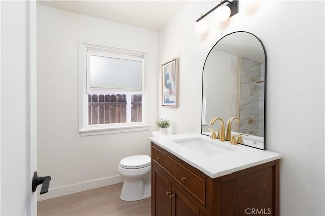 13203 Lakewood Blvd, Downey, CA 90242 - bathroom with vanity, wood finished floors, and a shower