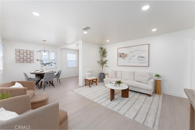 13203 Lakewood Blvd, Downey, CA 90242 - living area featuring wood finished floors and recessed lighting