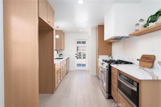 13203 Lakewood Blvd, Downey, CA 90242 - kitchen featuring stainless steel gas range oven, light wood-style floors, and recessed lighting