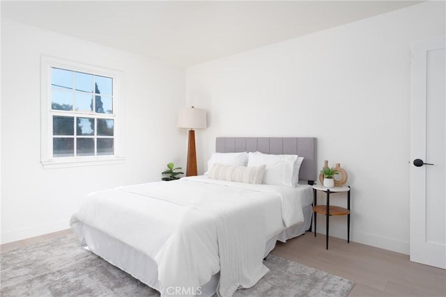 13203 Lakewood Blvd, Downey, CA 90242 - bedroom with wood finished floors and baseboards