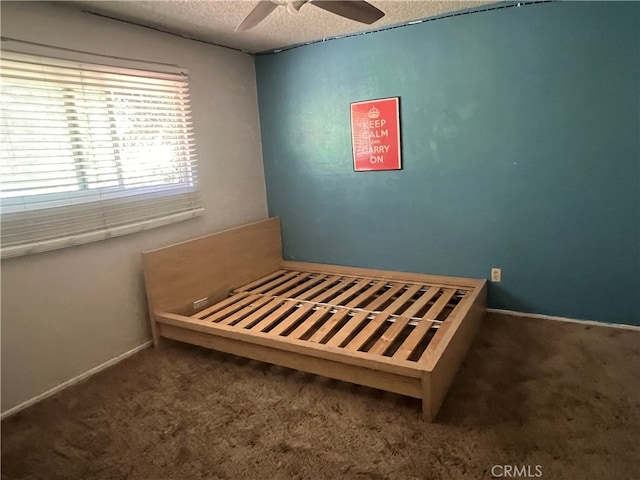 946 W Woodcrest, Bloomington, CA 92316 - unfurnished bedroom with carpet floors, a textured ceiling, and a ceiling fan