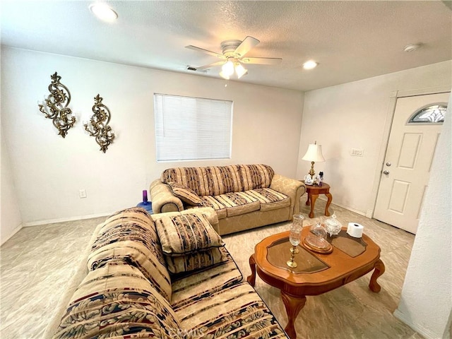 1325 Norton Ave, Dos Palos, CA 93620 - living room with a ceiling fan, recessed lighting, and a textured ceiling