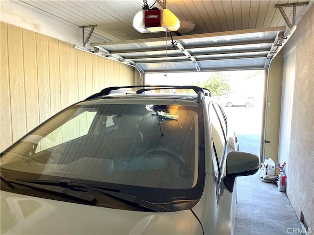 1325 Norton Ave, Dos Palos, CA 93620 - garage featuring a garage door opener
