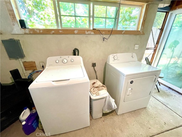 1325 Norton Ave, Dos Palos, CA 93620 - laundry area featuring separate washer and dryer and wood finished floors