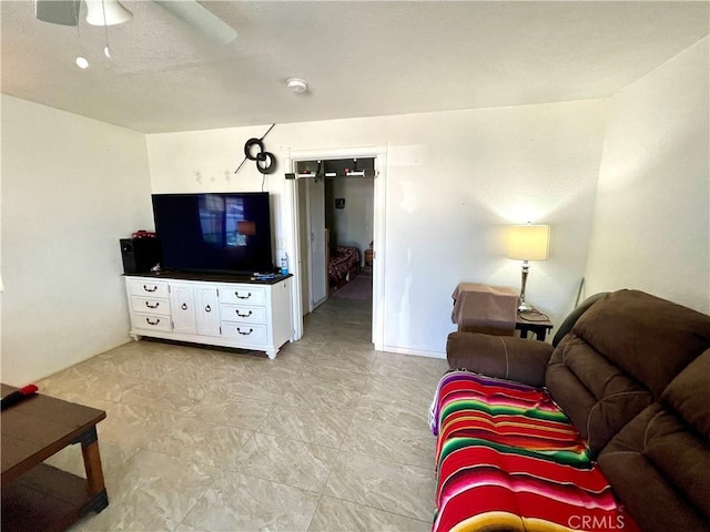 1325 Norton Ave, Dos Palos, CA 93620 - living area featuring a ceiling fan