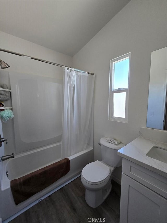 18812 Arbor Ct, Adelanto, CA 92301 - full bathroom featuring wood finished floors, vanity, shower / bath combination with curtain, and vaulted ceiling